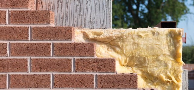 Why were cavity walls introduced?